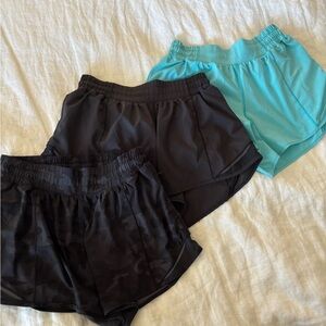 Lululemon Black, Black Camo, and Teal Athletic Shorts